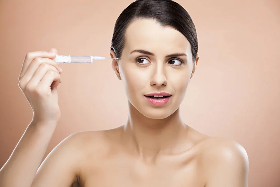 a woman is having Botox Facial treatment in Pune